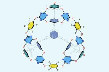 A molecular structure featuring oxygen atoms connecting carbon rings, some of which have fluorine side groups and others include nitrogen in the rings, into a large ball-like 3d structure.